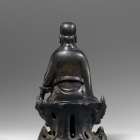 A SILVER-INLAID BRONZE FIGURE OF WEN CHANG