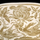 A A CARVED TWO-COLOR DINGYAO PORCELAIN ‘DUCKS AND LOTUS’ PILLOW