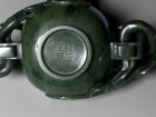 AN IMPERIAL GREEN JADE ‘DRAGONS’ WINE CUP