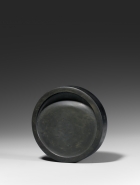 A SHE INKSTONE IN THE FORM OF A HAN TILE-END