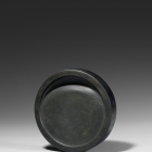 A SHE INKSTONE IN THE FORM OF A HAN TILE-END