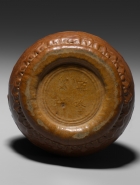 AN IMPERIAL MOULDED GOURD JAR AND COVER