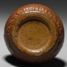 AN IMPERIAL MOULDED GOURD JAR AND COVER