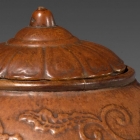 AN IMPERIAL MOULDED GOURD JAR AND COVER