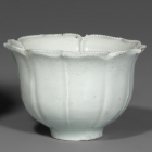 A QINGBAI PRUNUS CUP AND FOLIATE DISH